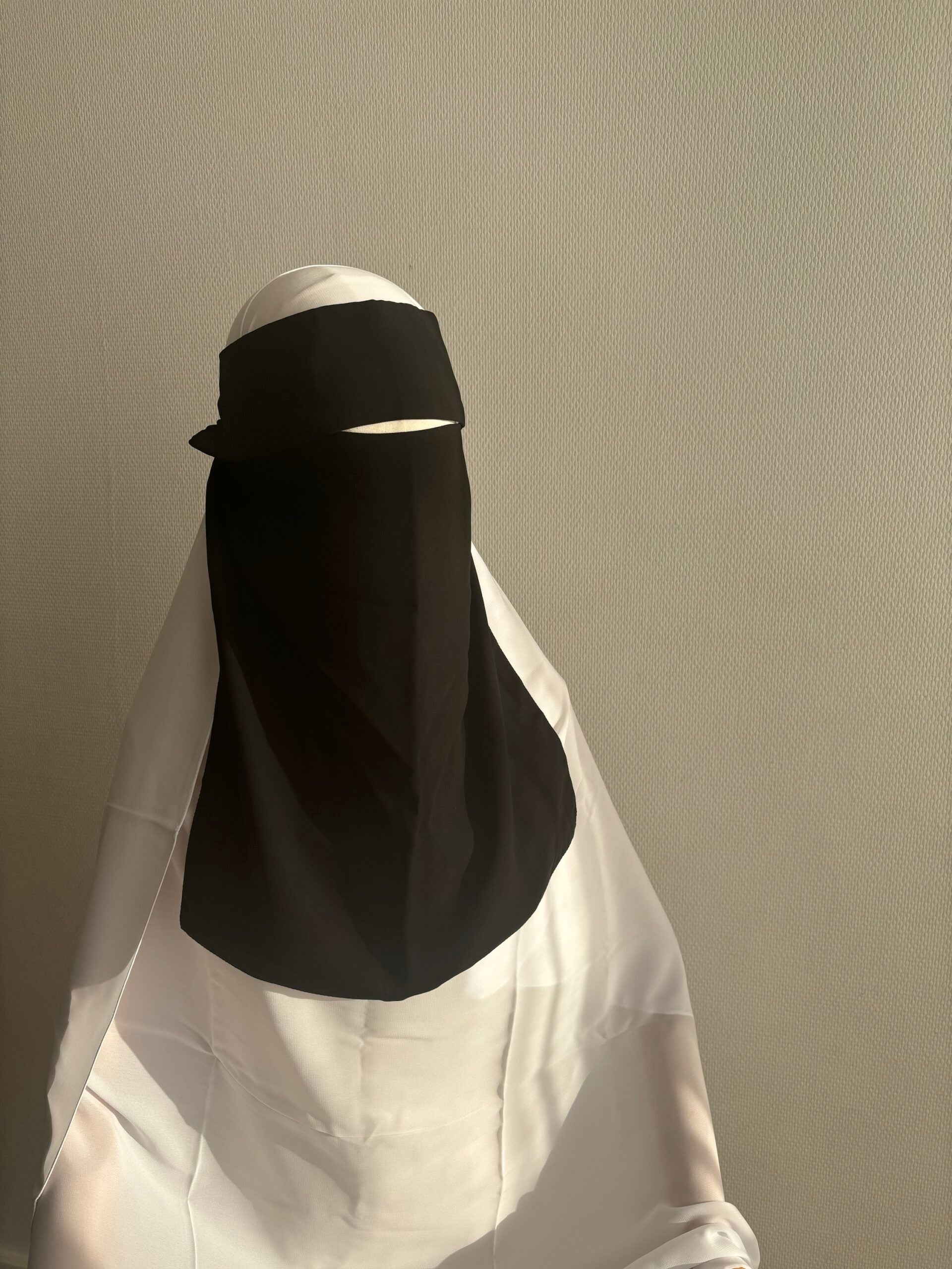 Niqab herunterziehen